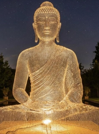 Buddha sculpture at night